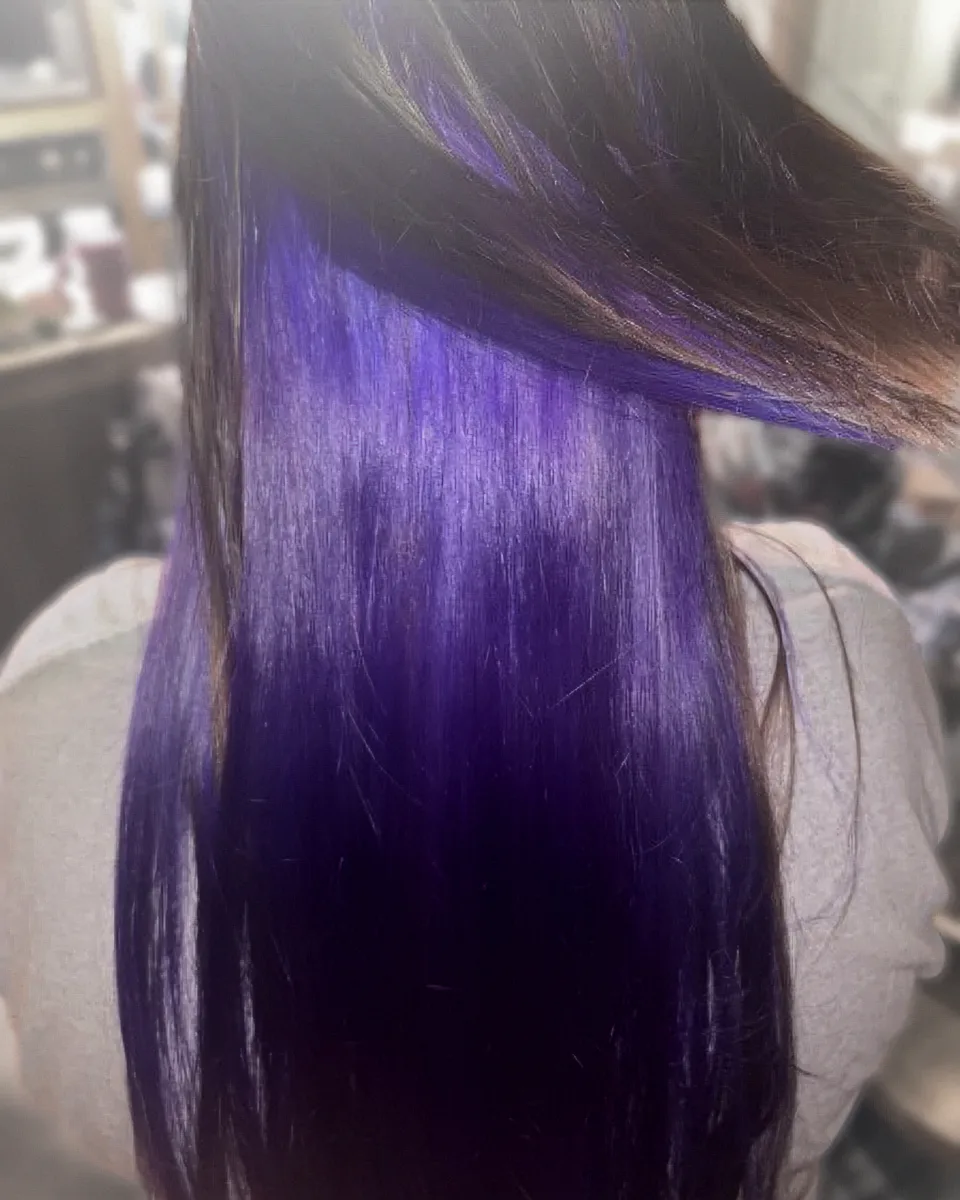 Violet underlights beneath dark brown
